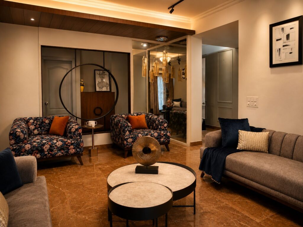 Luxury living room interior featuring printed floral armchairs, nested coffee tables, tufted sofa, and glass pendant chandelier by Urban Box Studio
