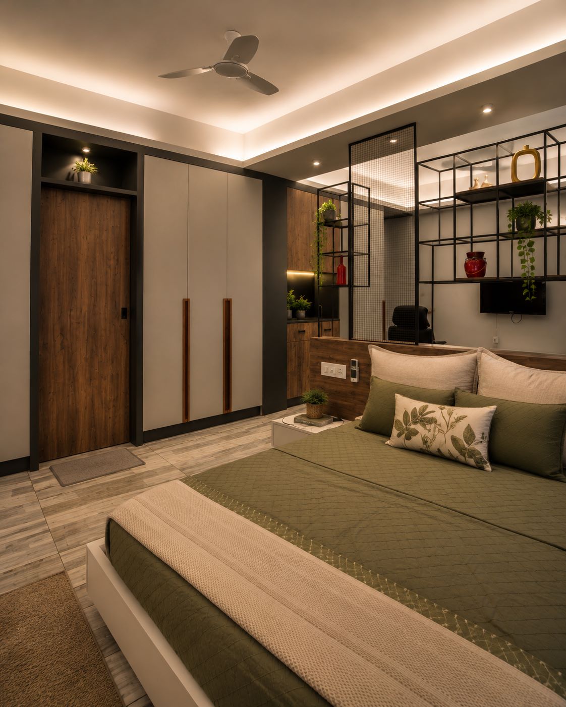 Contemporary bedroom design with olive green quilted bed, black open metal display shelving partition, and grey wardrobes by Urban Box Studio