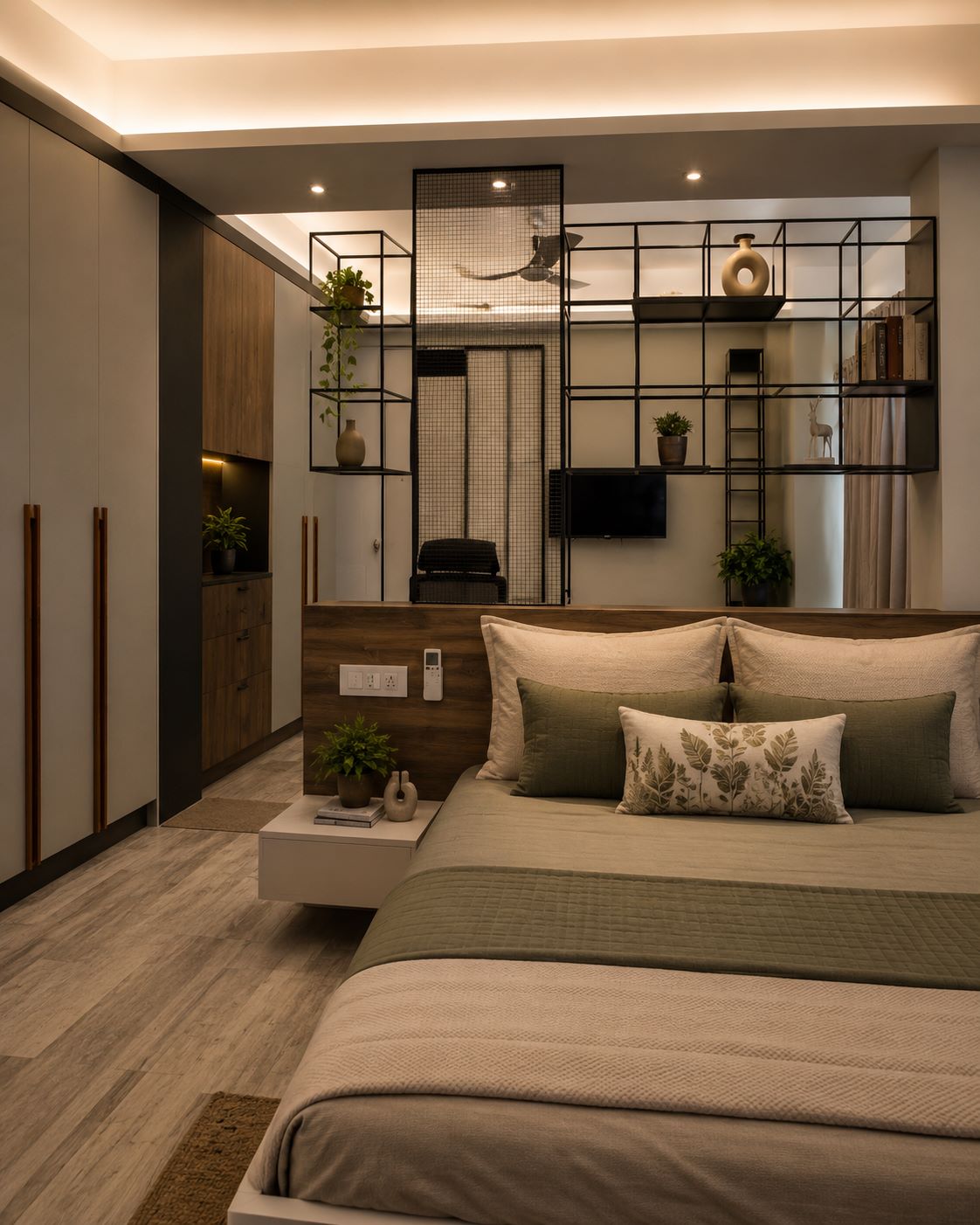 Modern bedroom bed layout with floral accent cushion, wooden headboard with integrated switches, and open display shelves by Urban Box Studio