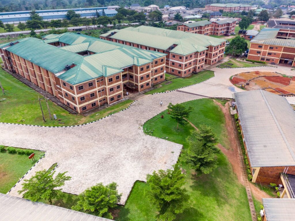 Aerial shot of a university campus in Ota, Nigeria, showcasing modern educational architecture.