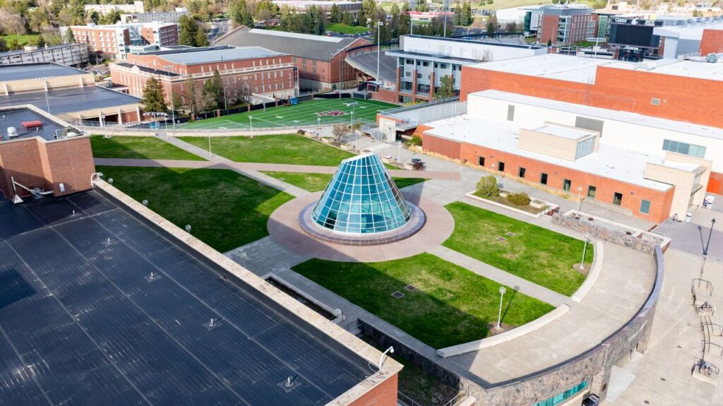 Drone shot of Washington State University's distinctive glass structure.