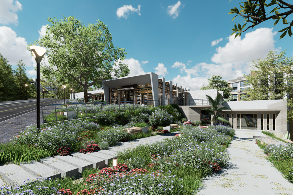 Contemporary building with eco-friendly design and vibrant garden landscape under a bright blue sky.