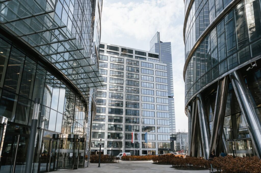 Contemporary skyscrapers in Warsaw's cityscape highlighting modern architectural design.
