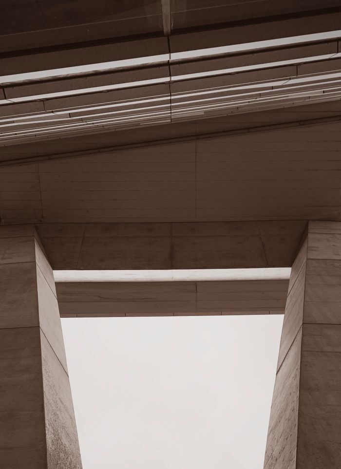Low angle view of modern architectural structure in The Hague, showcasing an abstract gap.